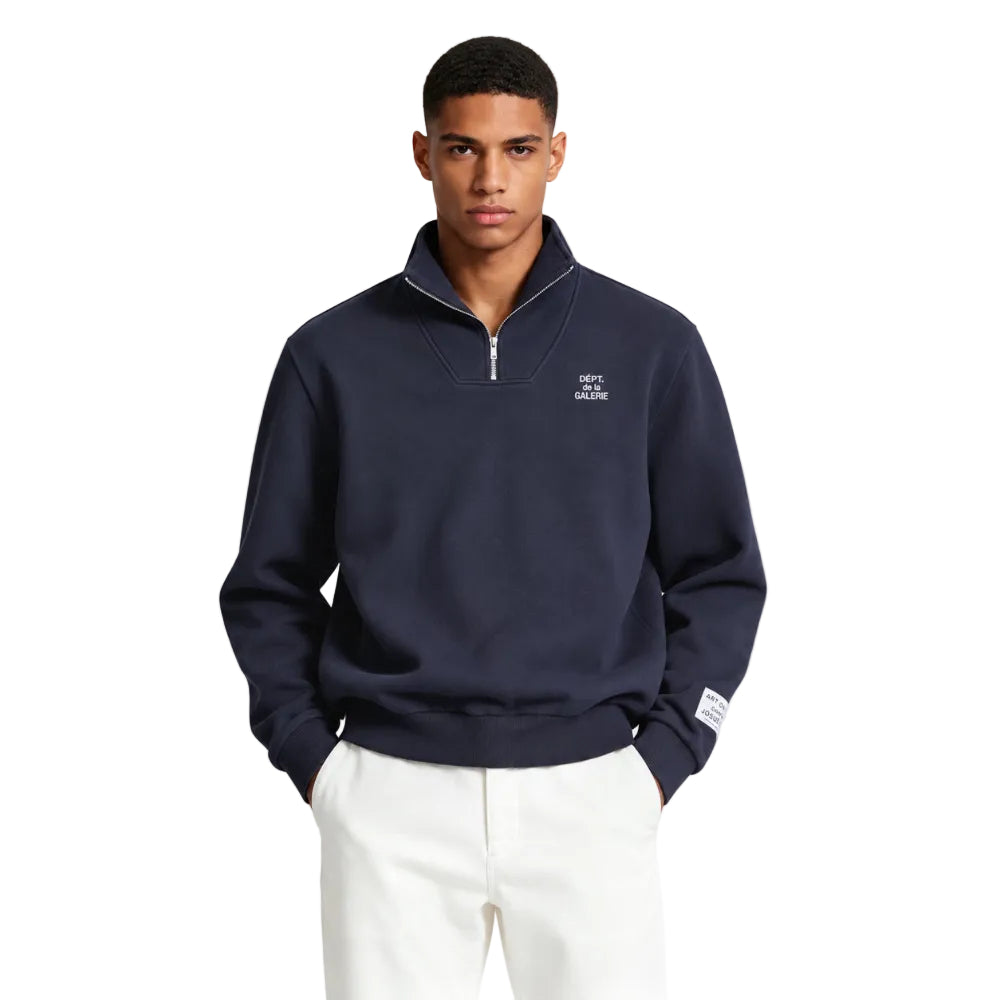 Model wearing Gallery Dept. 1 4 Zip Pullover Navy – front view highlighting the white chest lettering and quarter-zip neckline