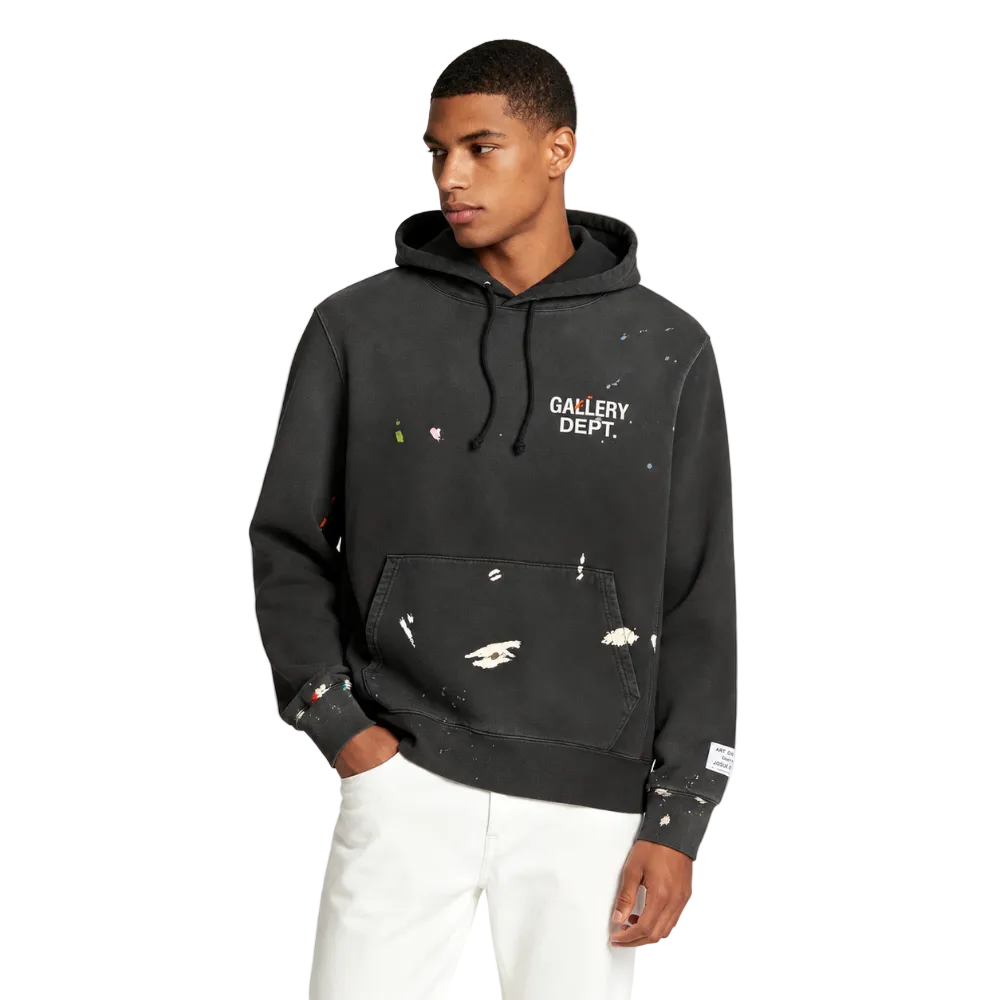 Model wearing Gallery Dept. GD Paint Logo Hoodie in Vintage Black – front view showing chest logo and hand-painted details