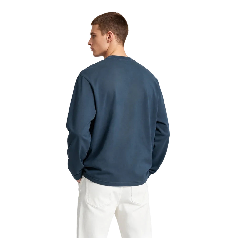 Acne Studios Sprayed 1996 Logo T-Shirt Deep Blue worn by model – back view displaying the vintage washed effect and relaxed fit