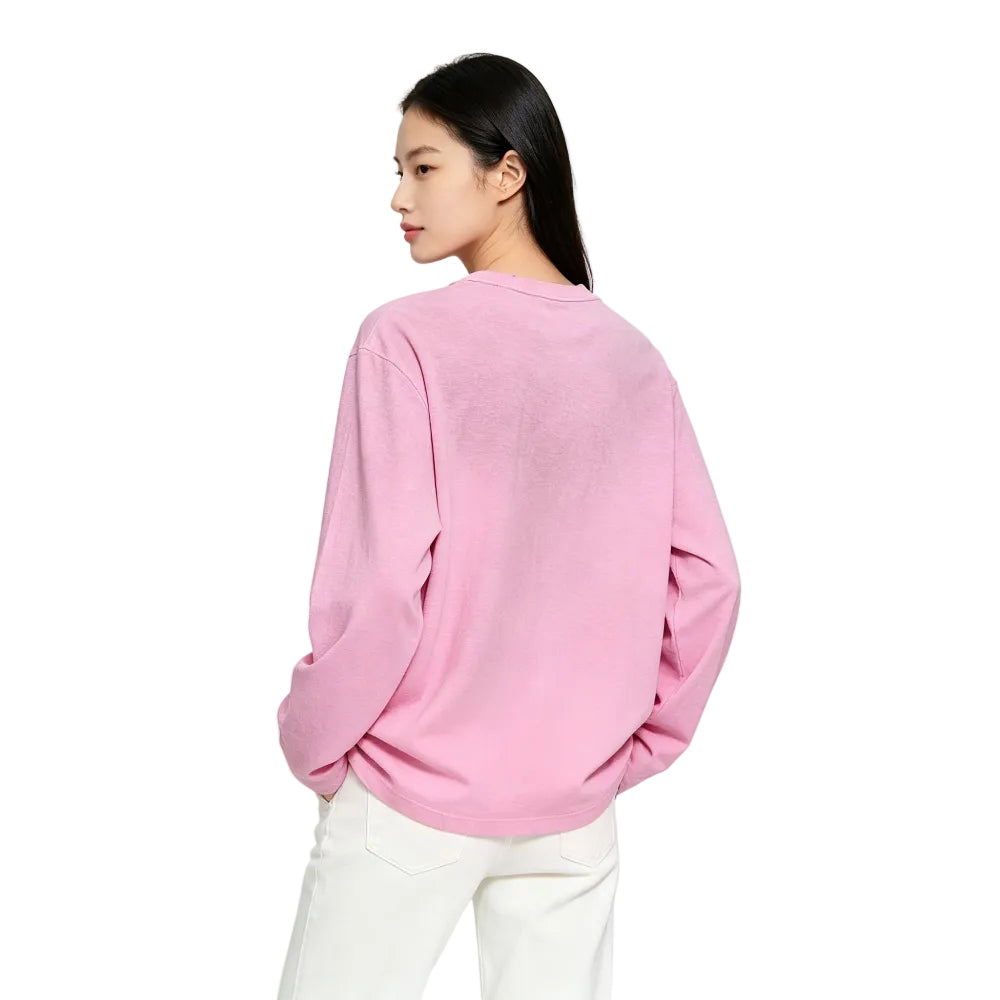 Acne Studios Sprayed 1996 Logo T Shirt Cotton Candy Pink worn by model – back view displaying the vintage spray effect and loose long-sleeve shape