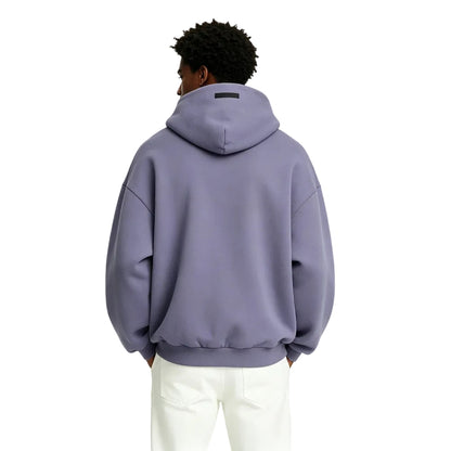 Fear of God Essentials Heavy Fleece Hoodie Lavender shown on model from the back