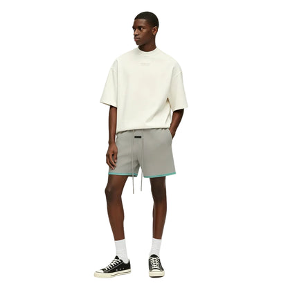 Fear of God Essentials Sweatshorts Seal worn by model from the front