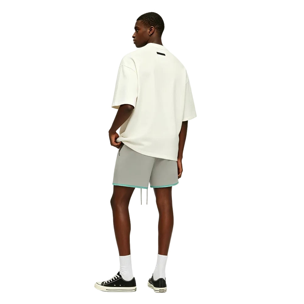 Fear of God Essentials Sweatshorts Seal shown on model from the back