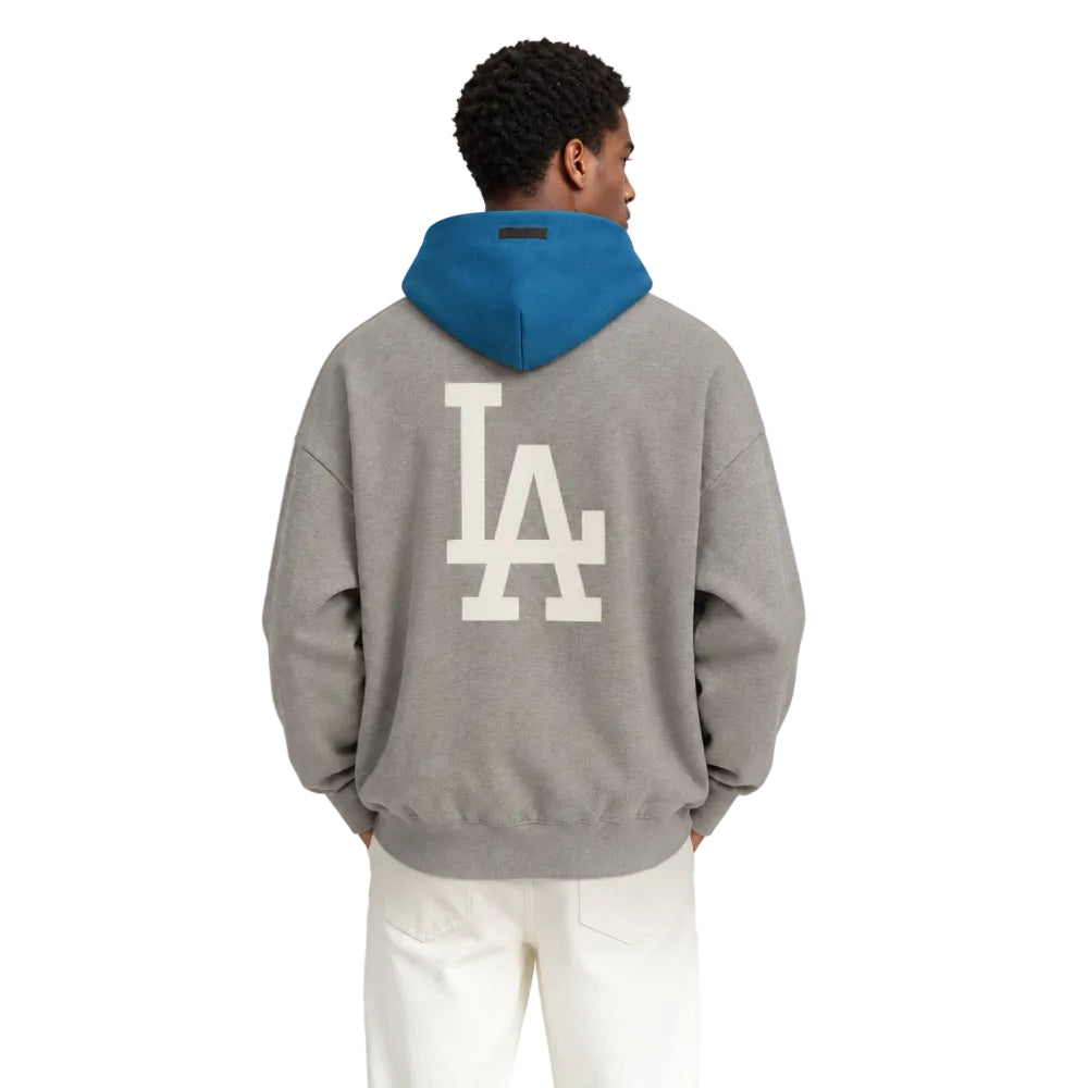 Fear of God Essentials Dodgers Sport Hoodie Concrete Heather Blue Sapphire shown on model from the back