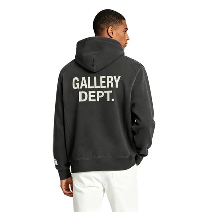 Gallery Dept. GD Paint Logo Hoodie Vintage Black worn by model – rear view displaying large GD graphic and vintage washed texture