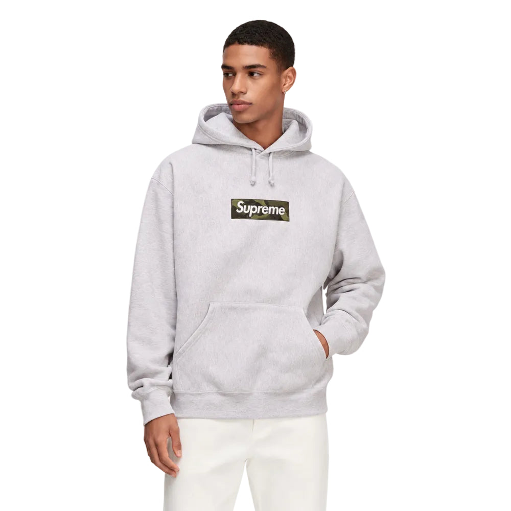 Model wearing Supreme Box Logo Hooded Sweatshirt FW23 Ash Grey – front view highlighting the camo chest logo and drawstring hood