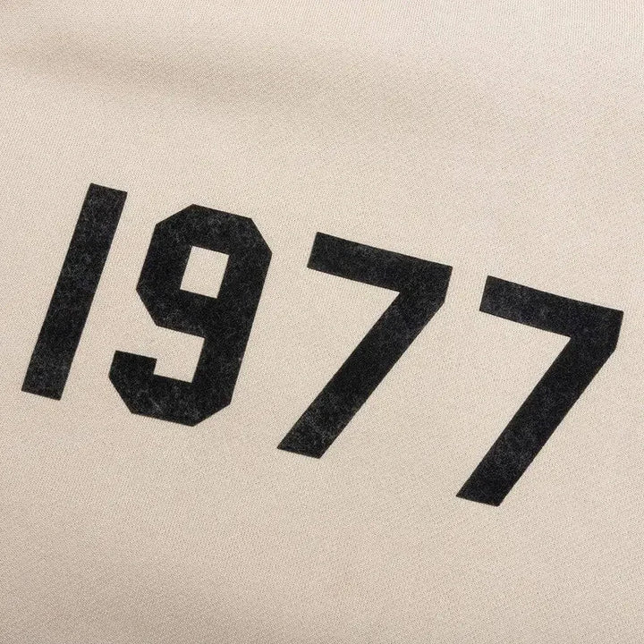Fear of God Essentials 1977 Logo Crewneck Wheat - AFV Clothes