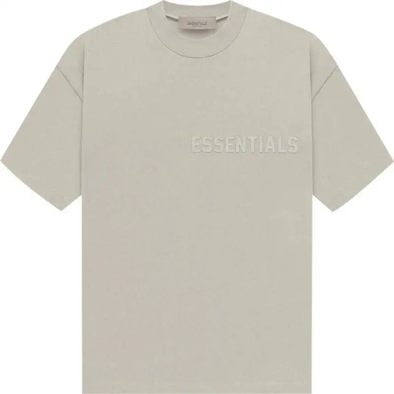 Fear of God Essentials Crew Neck Tee in neutral color, featuring premium cotton fabric and subtle printed branding."