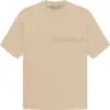 "Fear of God Essentials SS23 Short-Sleeve Tee in Sand color, featuring high-quality fabric and subtle branding."